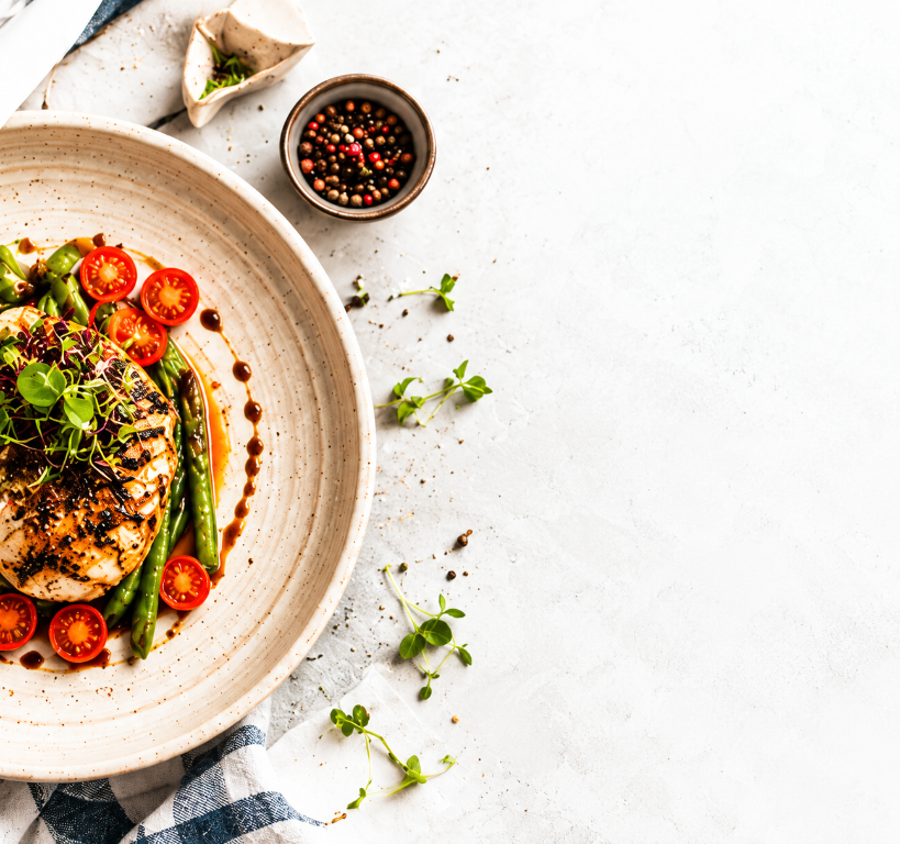 A freshly prepared restaurant meal on a ceramic plate